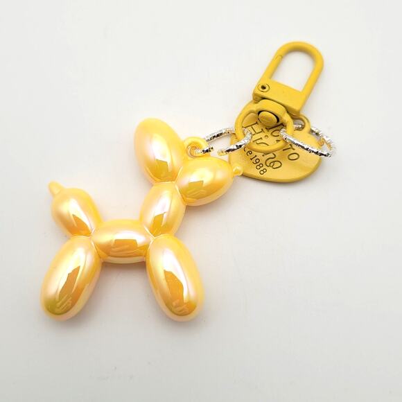 Balloon Animal Keychain iridescent Yellow Dog 1.5" Adorable - Picture 1 of 3